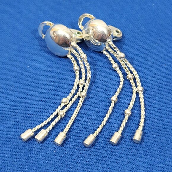 Silver-Tone Dangling Ball Tassel Earrings With Clip-On Backing - Picture 1 of 4